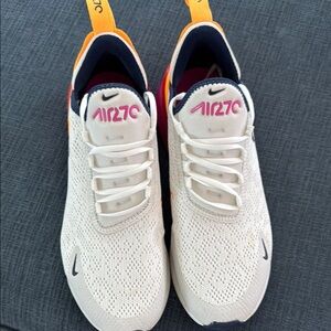 Nike White and Orange Sneakers with Minimalist Design